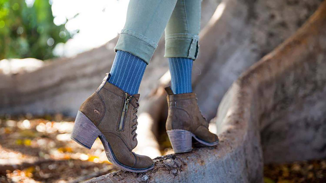 Who can benefit from wearing compression socks?