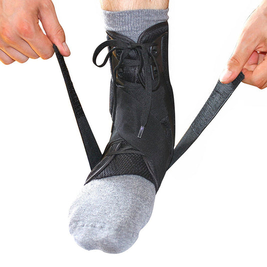 Black lace-up ankle brace over a gray sock, with adjustable crossing straps
