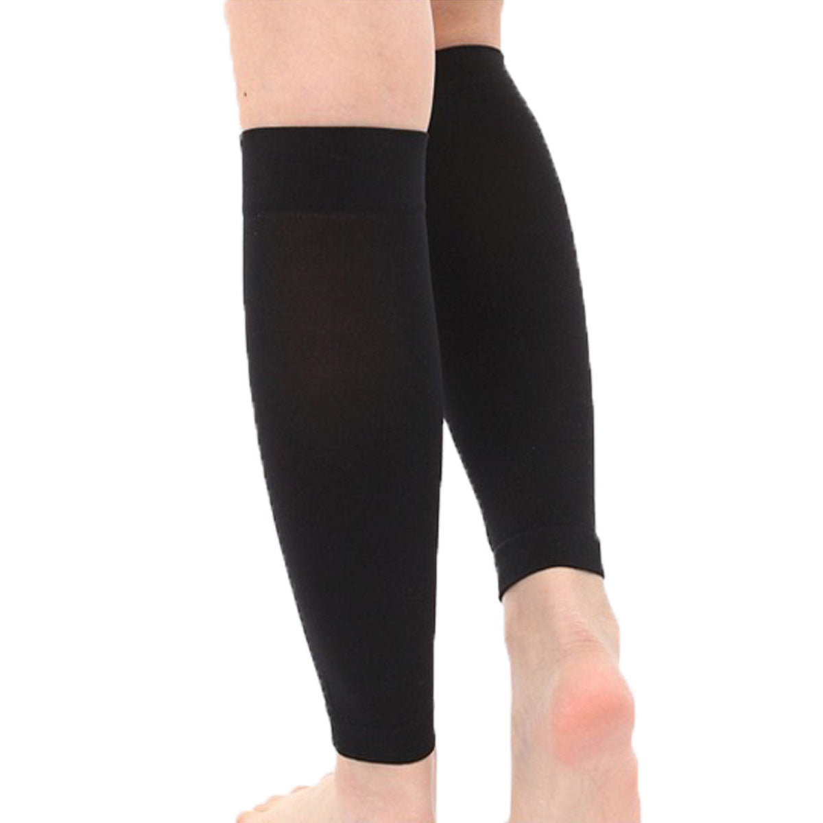 Pair of black calf support sleeves shown worn on the legs