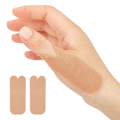Beige breathable thumb support tape patch worn on hand with two extra patches shown on white background