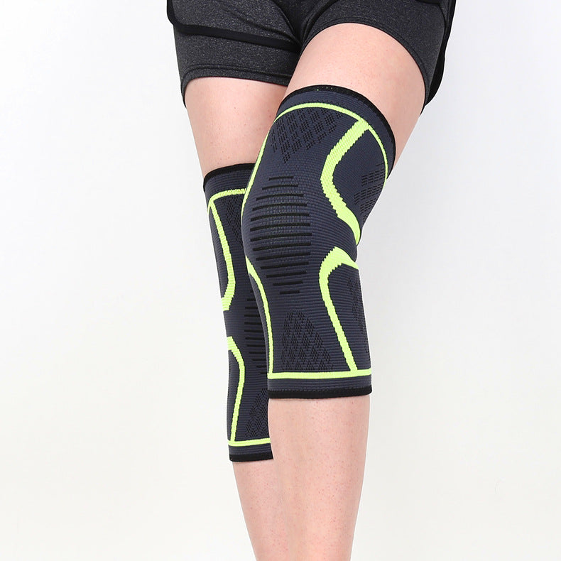 Orange anti-slip knitted knee sleeve worn on legs