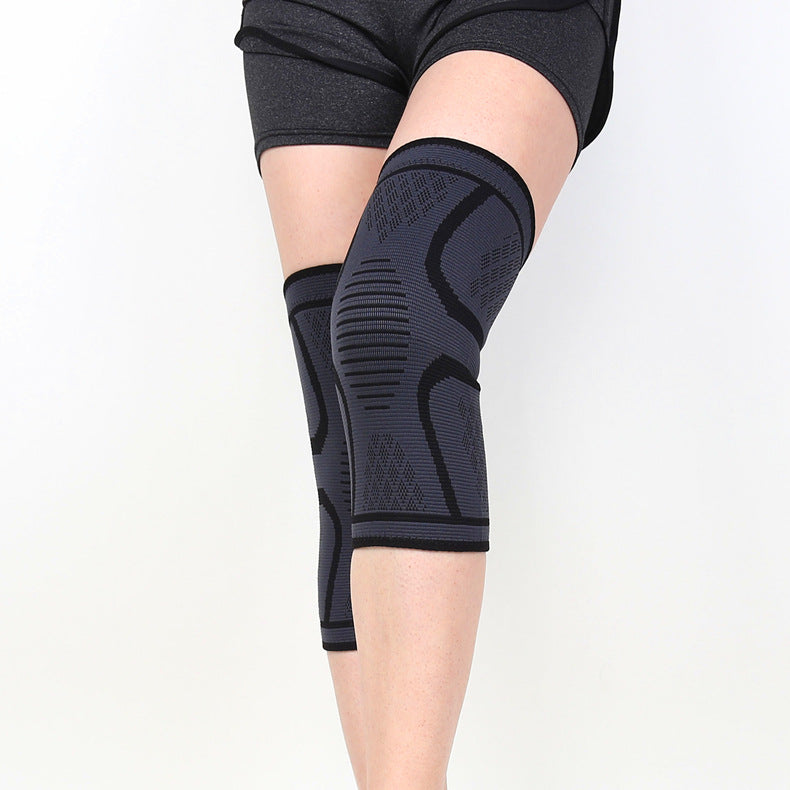Knitted knee support sleeve in black with blue trim front view