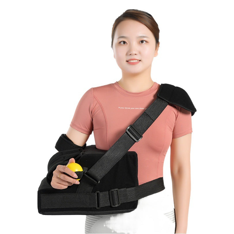 Black shoulder abduction support brace with padded pillow and adjustable stabilizing straps