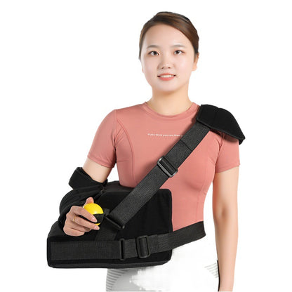 Black shoulder abduction support brace with padded pillow and adjustable stabilizing straps