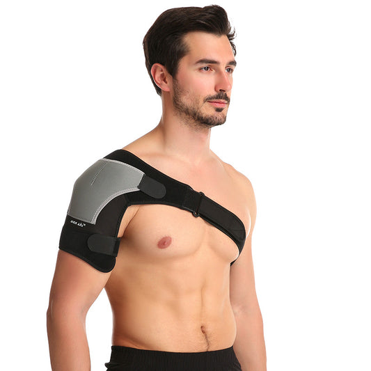 Adjustable shoulder support brace worn on the left shoulder in black and gray