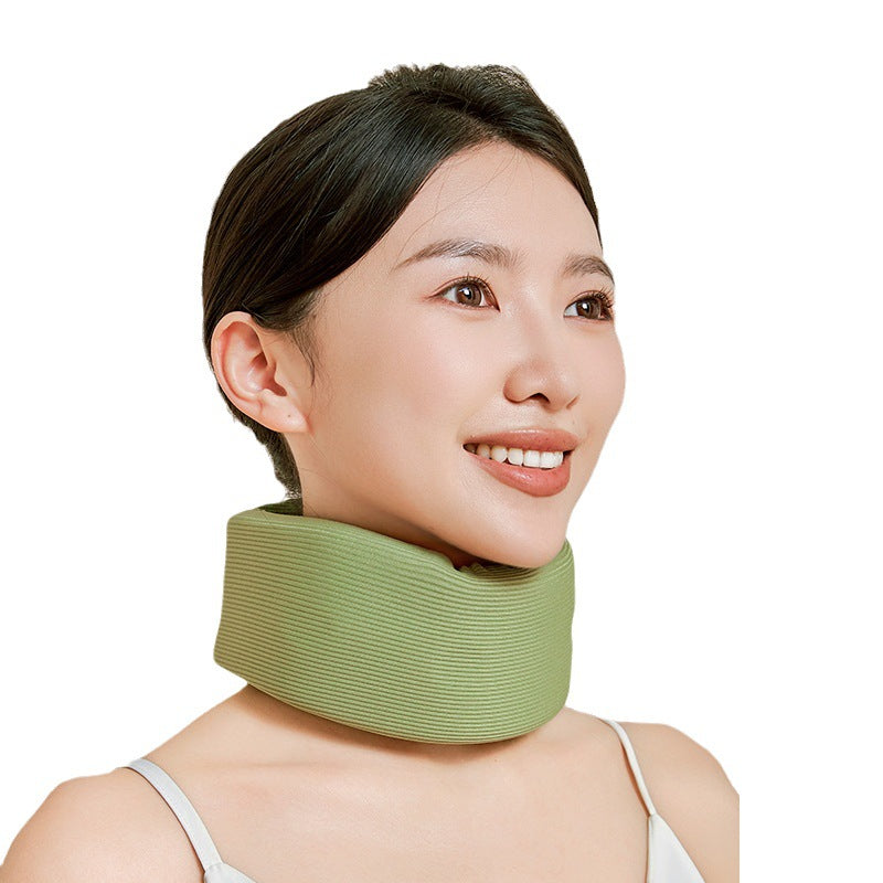 Model wearing a fruit green adjustable soft neck support brace with wraparound collar design