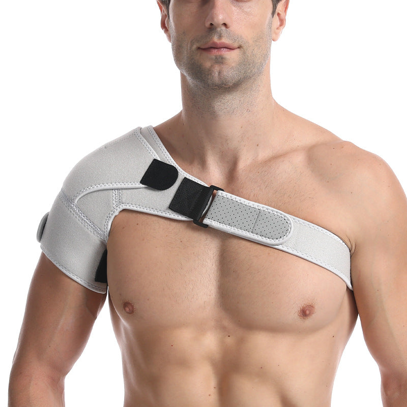 Black and blue shoulder support brace worn on model
