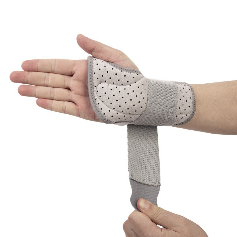 Black adjustable thumb wrist brace worn on hand with breathable mesh and wrap support