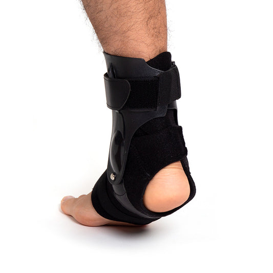 Adjustable ankle brace with rigid side support and open heel worn on foot