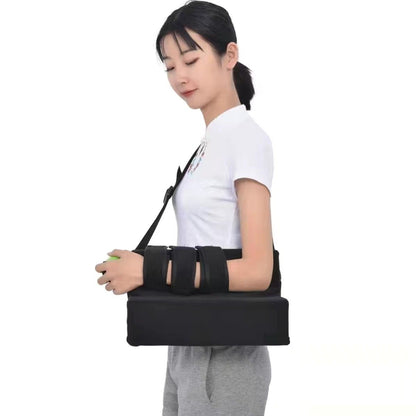 Side view of shoulder abduction brace showing reinforced strap layout and pillow support