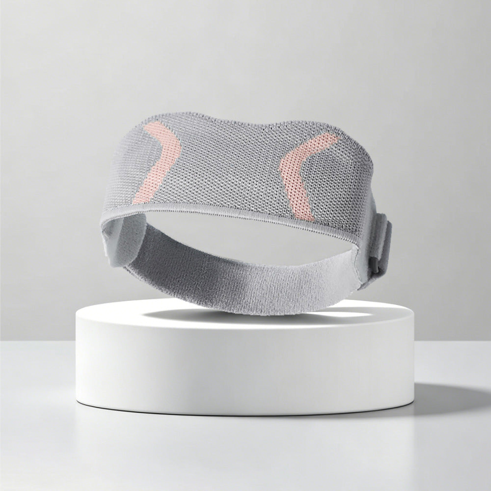 Gray patella knee support strap worn on knee