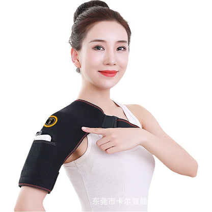 Black heated shoulder support pad worn over one shoulder and upper arm