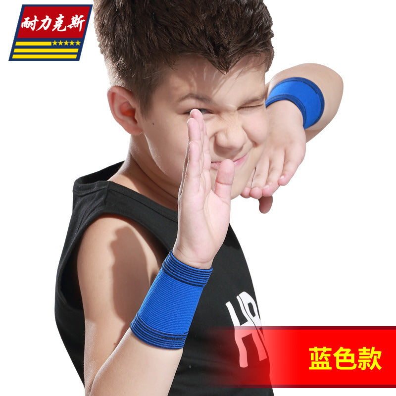 Child wearing blue protective sports sleeves for arms and legs