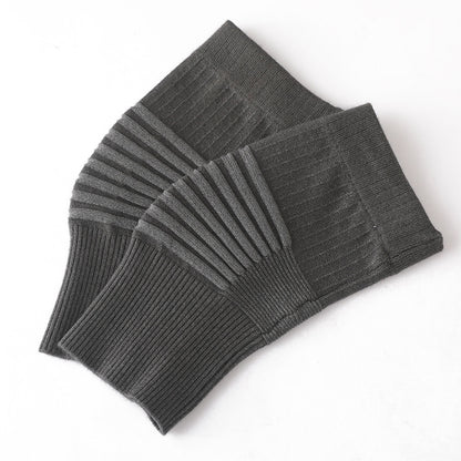 Dark gray knit knee support sleeve pair showing ribbed elastic texture