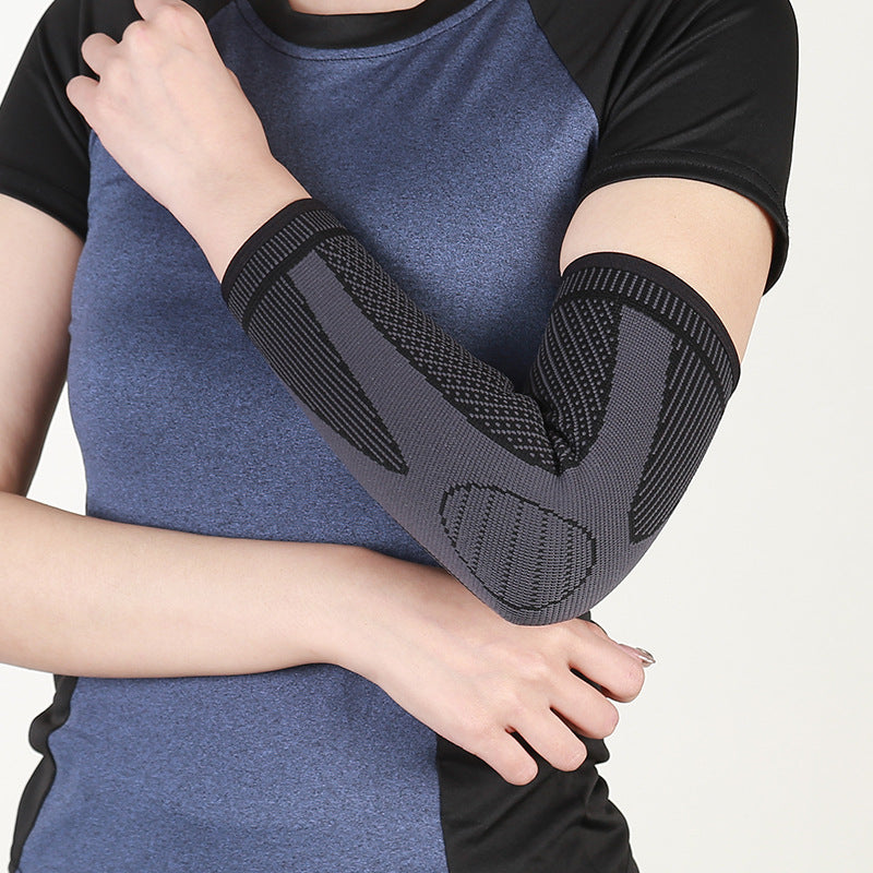 Close-up of knitted elbow brace sleeve texture and extended arm coverage