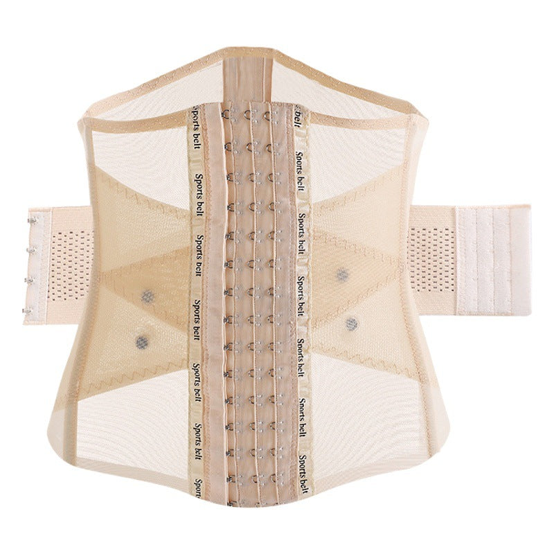 Woman wearing a breathable maternity belly support belt over clothing to show coverage and fit