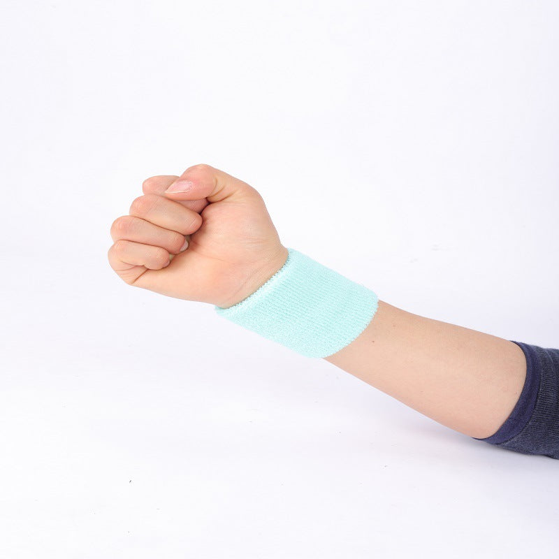 Black wrist support band worn on wrist