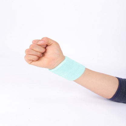 Black wrist support band worn on wrist