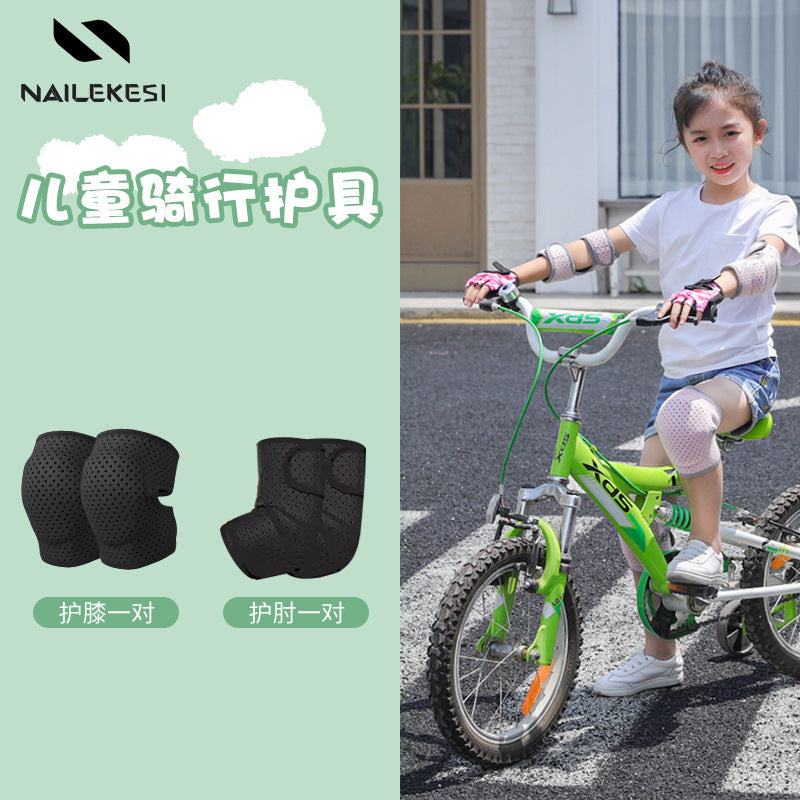 Black kids elbow pads shown worn during active movement