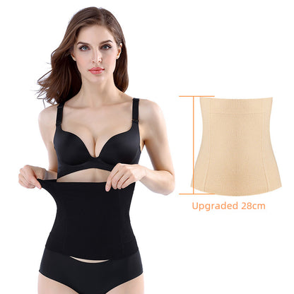 Close-up of black maternity belly support belt showing stretch knit fabric and front support area