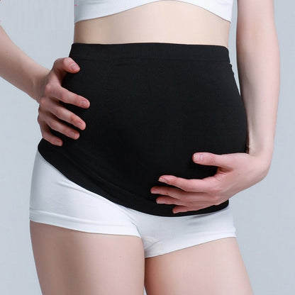 Front angle view of skin tone maternity support belt showing belly coverage