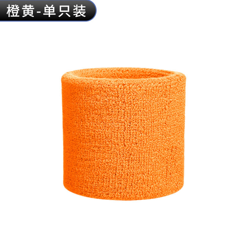 Bright blue cotton terry wrist sweatband on a white background