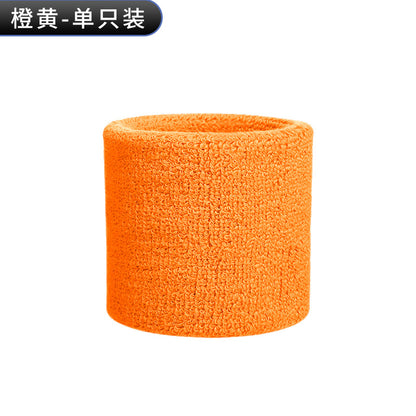 Bright blue cotton terry wrist sweatband on a white background