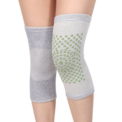 Front view of grey slip-on knee support sleeve with stretch knit texture