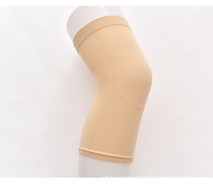 Black knee support sleeve worn on leg showing stretch fit