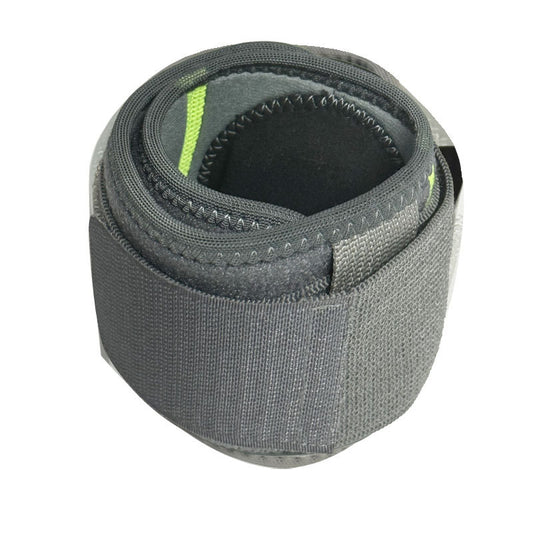 Dark gray adjustable elbow support brace with wraparound compression strap on white background