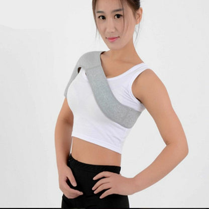 Adult model wearing one-shoulder support brace on a white background