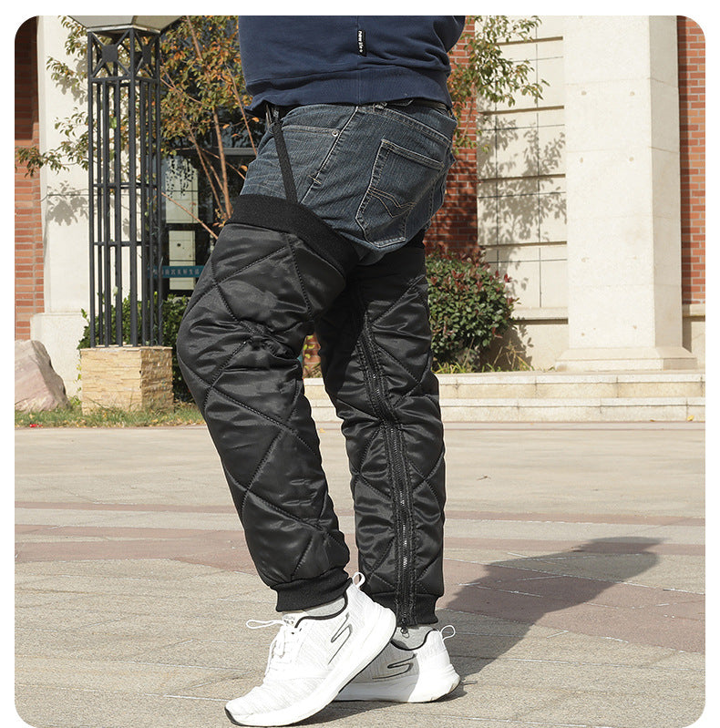 Single black quilted leg warmer sleeve showing shape and insulated outer design
