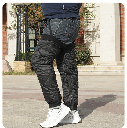 Single black quilted leg warmer sleeve showing shape and insulated outer design