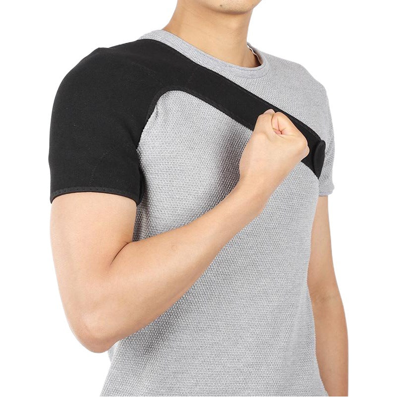 Black adjustable single shoulder support brace worn on one shoulder, front view
