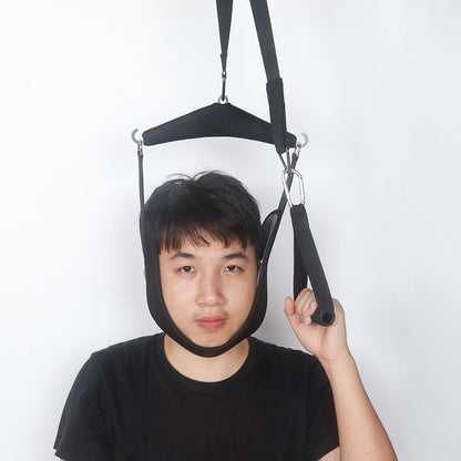 Black adjustable ankle brace worn to show strap placement and support fit