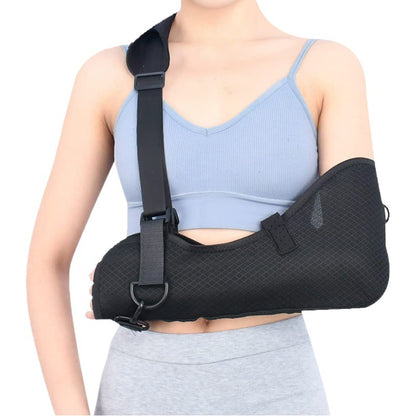Breathable mesh forearm sling support worn on arm with adjustable shoulder strap and padded support area