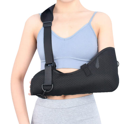Back view of black forearm sling showing shoulder strap routing and full sling shape