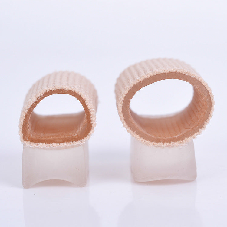 Toe separator support sleeves shown worn on both feet from multiple angles