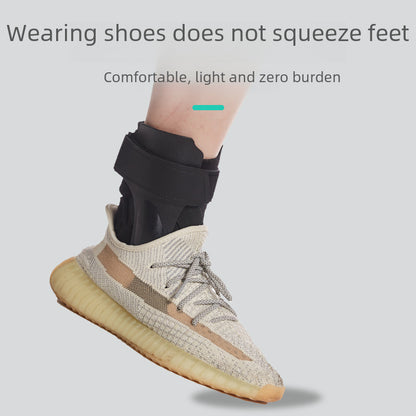 Black open heel ankle brace worn with a shoe