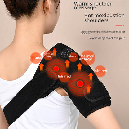 Adult wearing a black heated shoulder support brace with wraparound fit