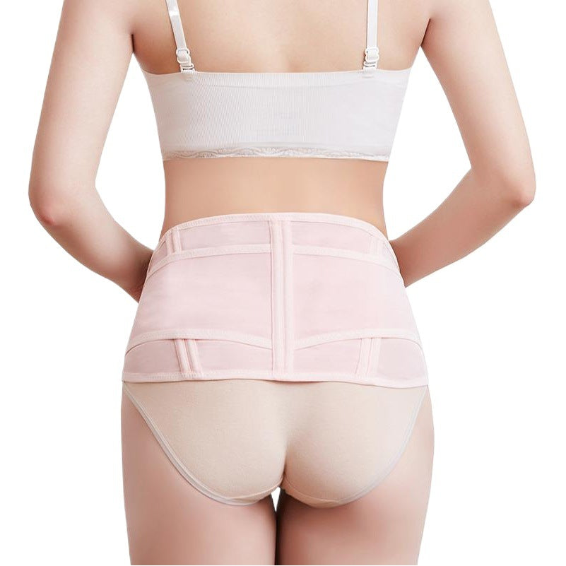 Rear view of pink maternity belly support belt showing wrap design