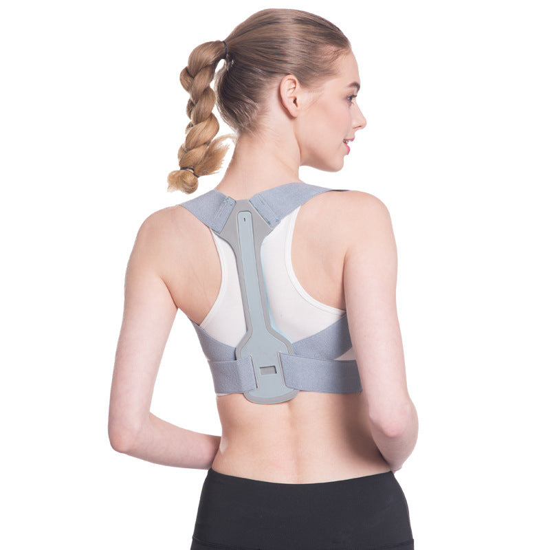 Gray posture support brace back view on an adult model