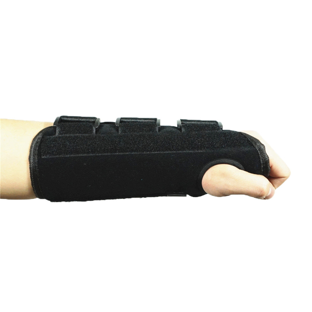 Thumb wrist brace with reinforced splint support shown in use