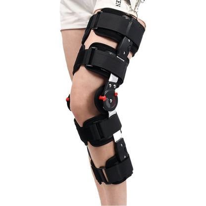 Adjustable hinged knee brace with multiple straps and shoulder suspension straps in black