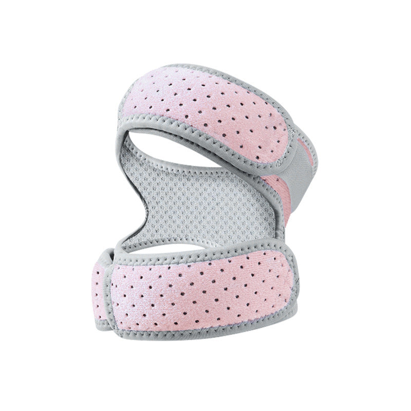 Pink adjustable patella knee brace with silicone pads and breathable perforated fabric on a white background