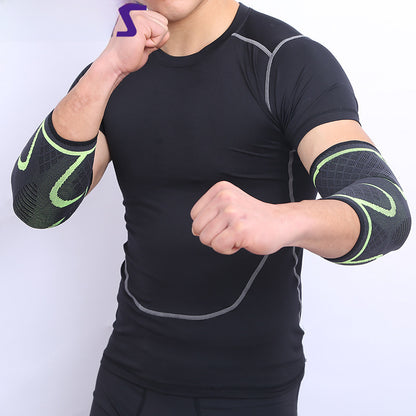 Green elbow support sleeves worn on both arms during exercise