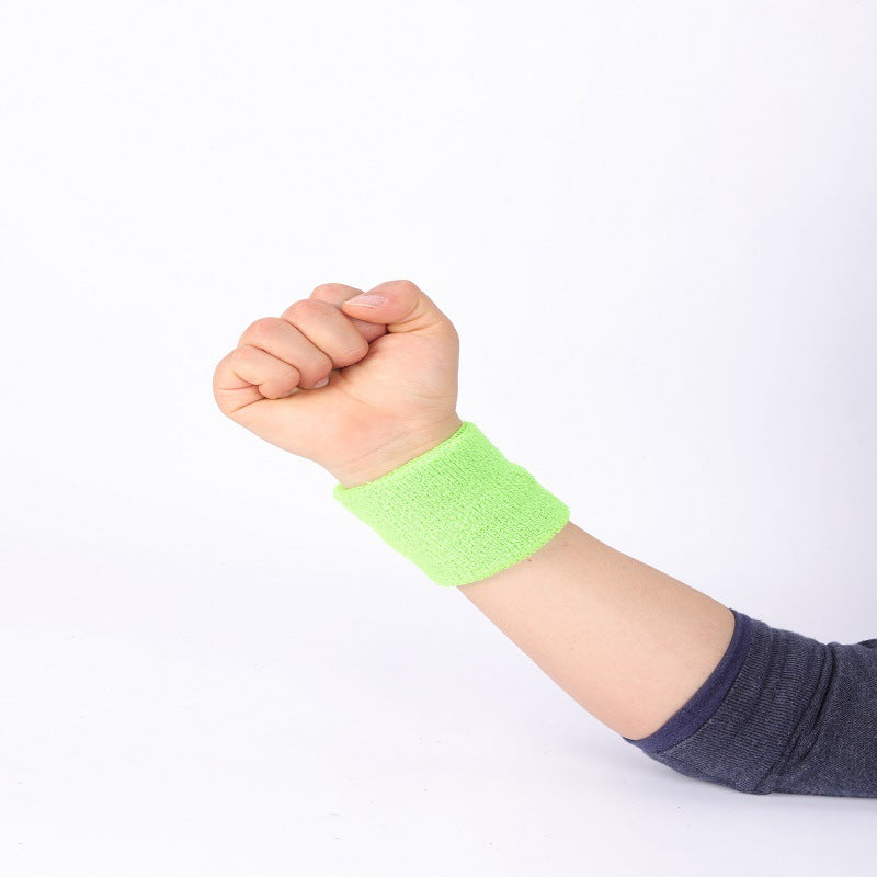 Cyan wrist support band worn on wrist