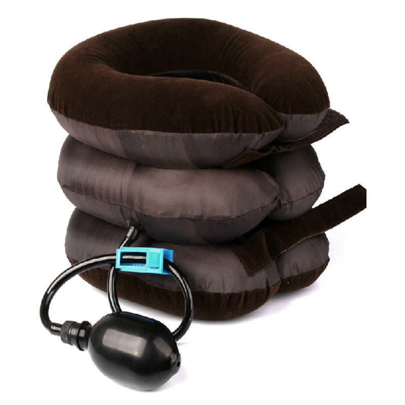 Coffee inflatable neck support brace with hand pump on white background
