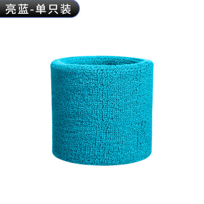 Blue cotton terry wrist sweatband on a white background
