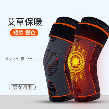 Pair of knit knee support sleeves in black with green accent lines